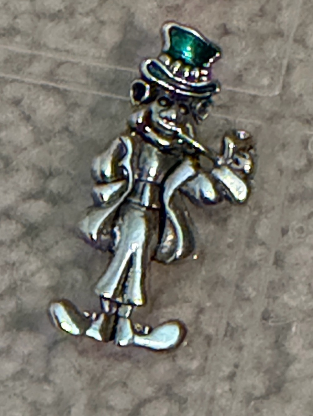 Vintage sterling silver charm pendant featuring a leprechaun smoking a pipe